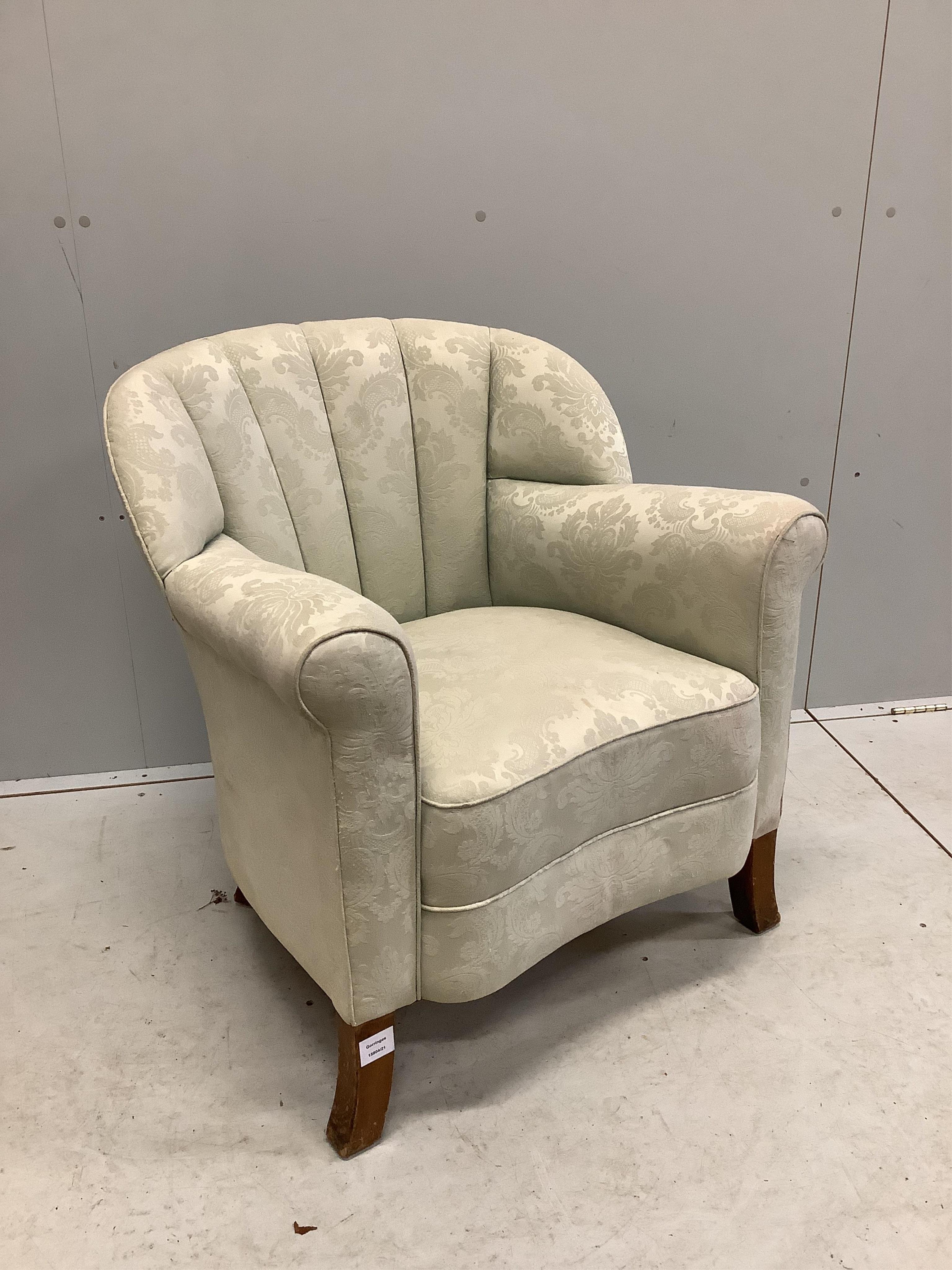 An Art Deco style upholstered tub shaped armchair, width 70cm, depth 68cm, height 76cm. Condition - fair